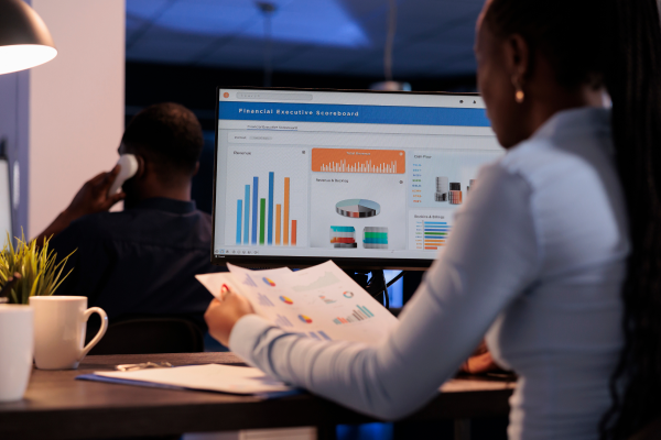 lady working with charts on a screen