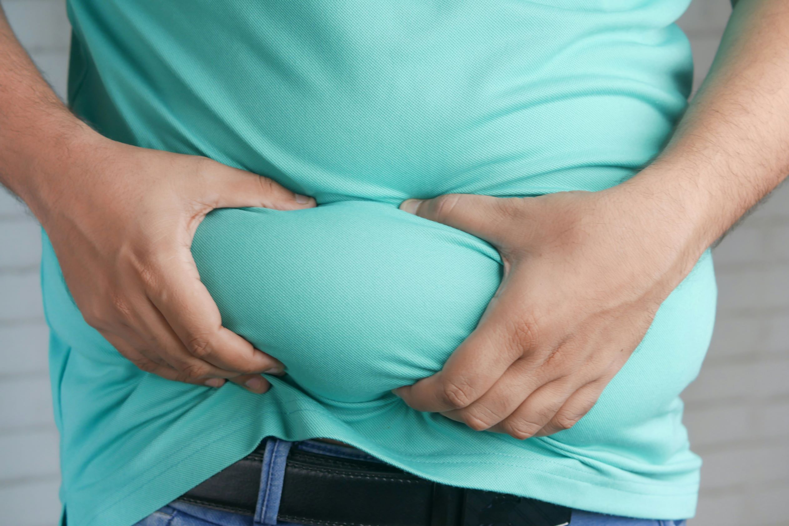 Tackling Lower Abdominal Bulging: Understanding Causes and Solutions for Workplace Wellness